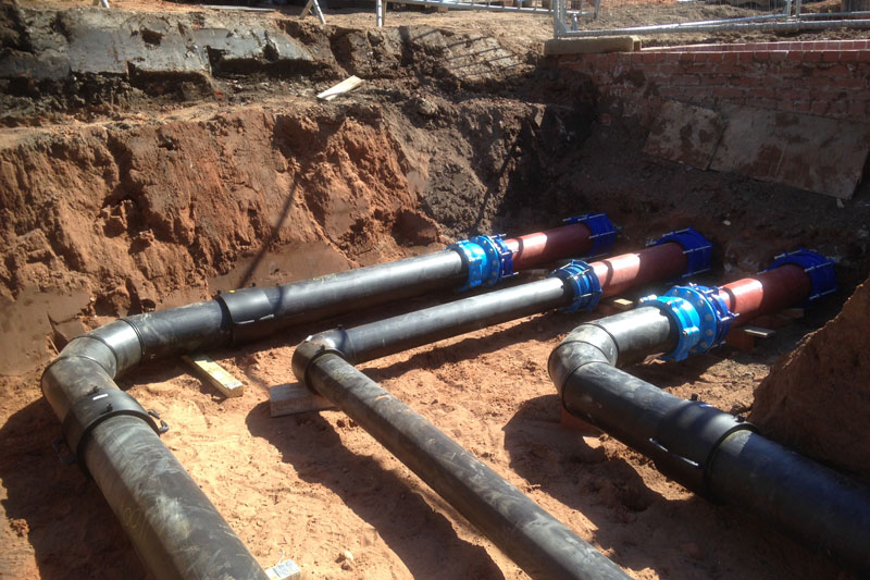 image of fixed broken pipe being connected with existing pipe for drainage